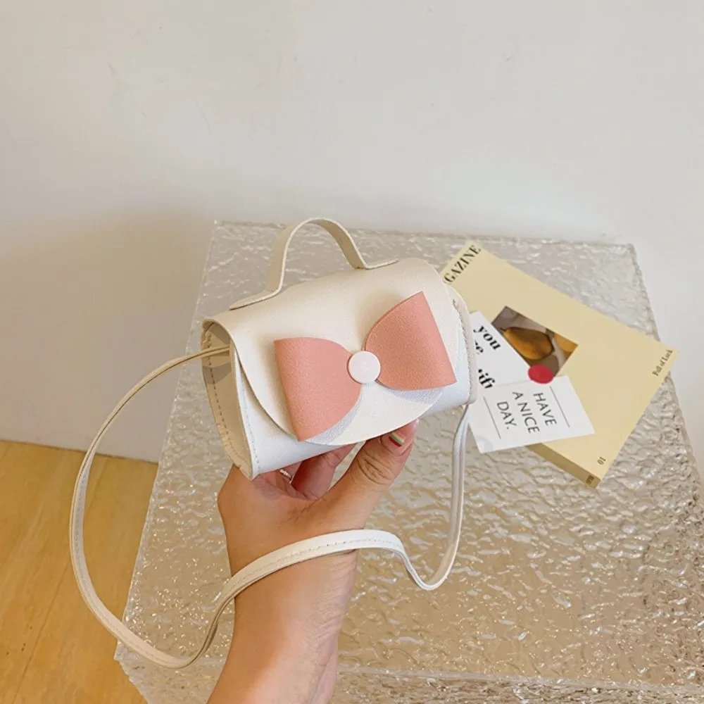 

Модная сумка-кроссбоди с милым бантом, из искусственной кожи, на одно плечо, с мультяшным дизайном, маленькая квадратная сумка для путешествий