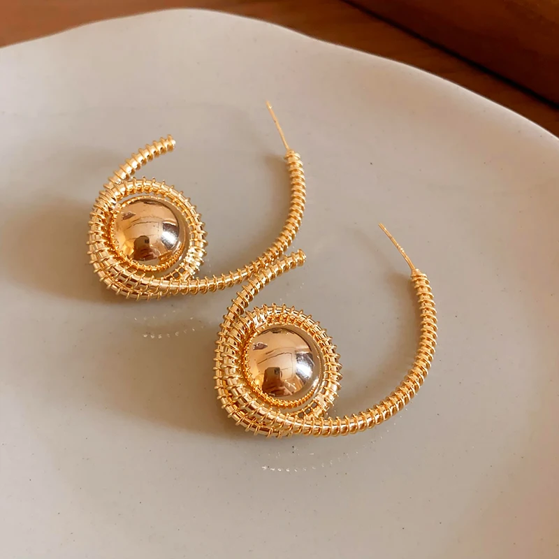 

Gold European and American exaggerated earrings