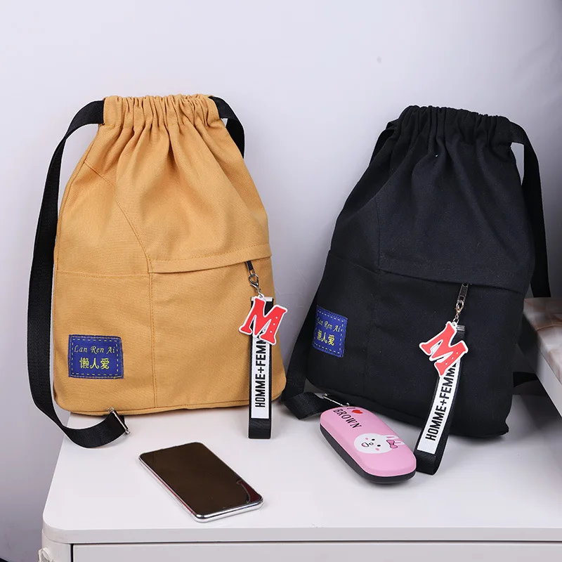 Drawstring backpack female Korean small backpack male student schoolbag canvas bundle pocket ins leisure travel bag