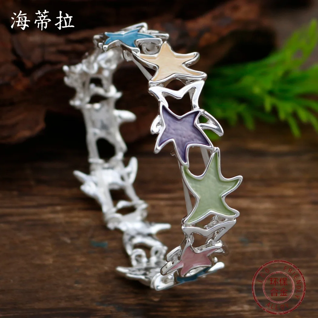 New enamel color hollow star elastic bracelet women's simple high-end sense five-pointed star zinc alloy bracelet