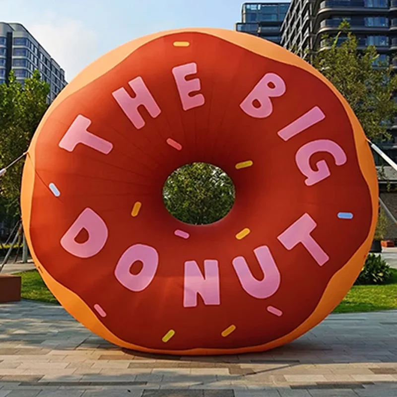 

Inflatable doughnuts, promotional props for outdoor dessert shop events, with blowers
