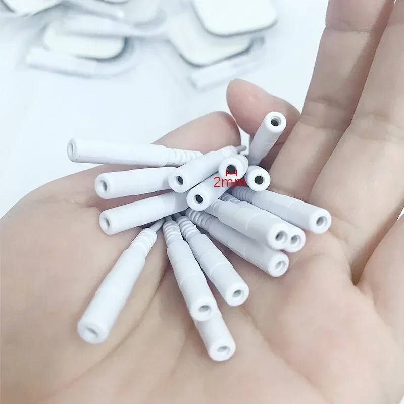 استبدال الوسادة لعشرات وحدة آلة تدليك العضلات محفز 2 مللي متر التوصيل أقطاب الوسادة قابلة لإعادة الاستخدام لصقة هلامية لأداة تدليك Ems