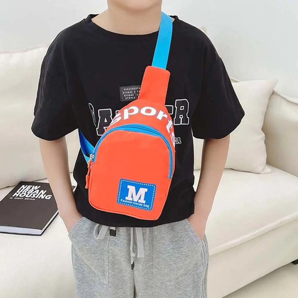 Bolso de pecho de nailon con letras M para niños, bandolera de estilo coreano, monedero de viaje al aire libre