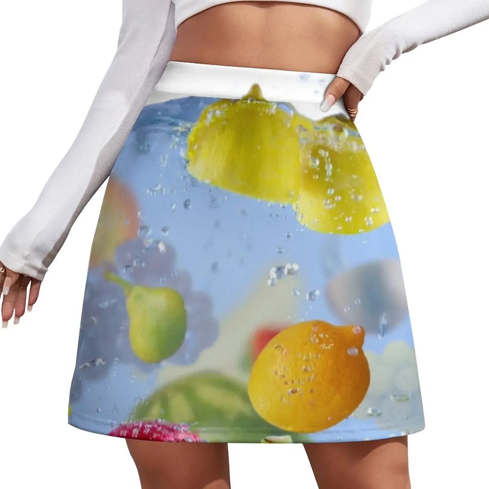 Fresh Fruits shot as they submerged under water background food delicious splash in aquarium Mini Skirt skirt sets