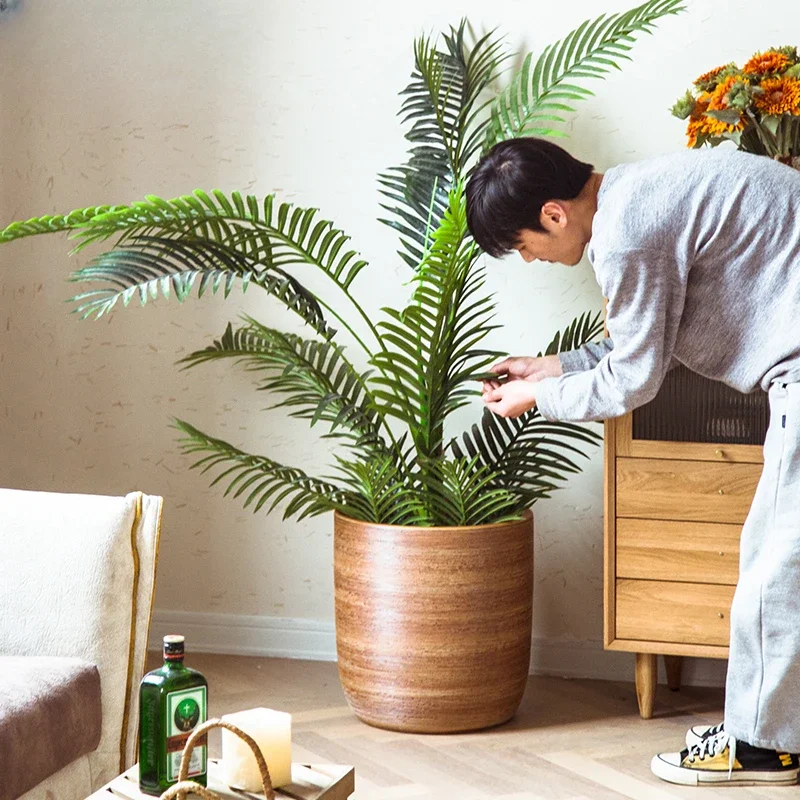 

The product can be customized.Nordic modern simple floor to ceiling flower pot indoor green plant decoration plants large