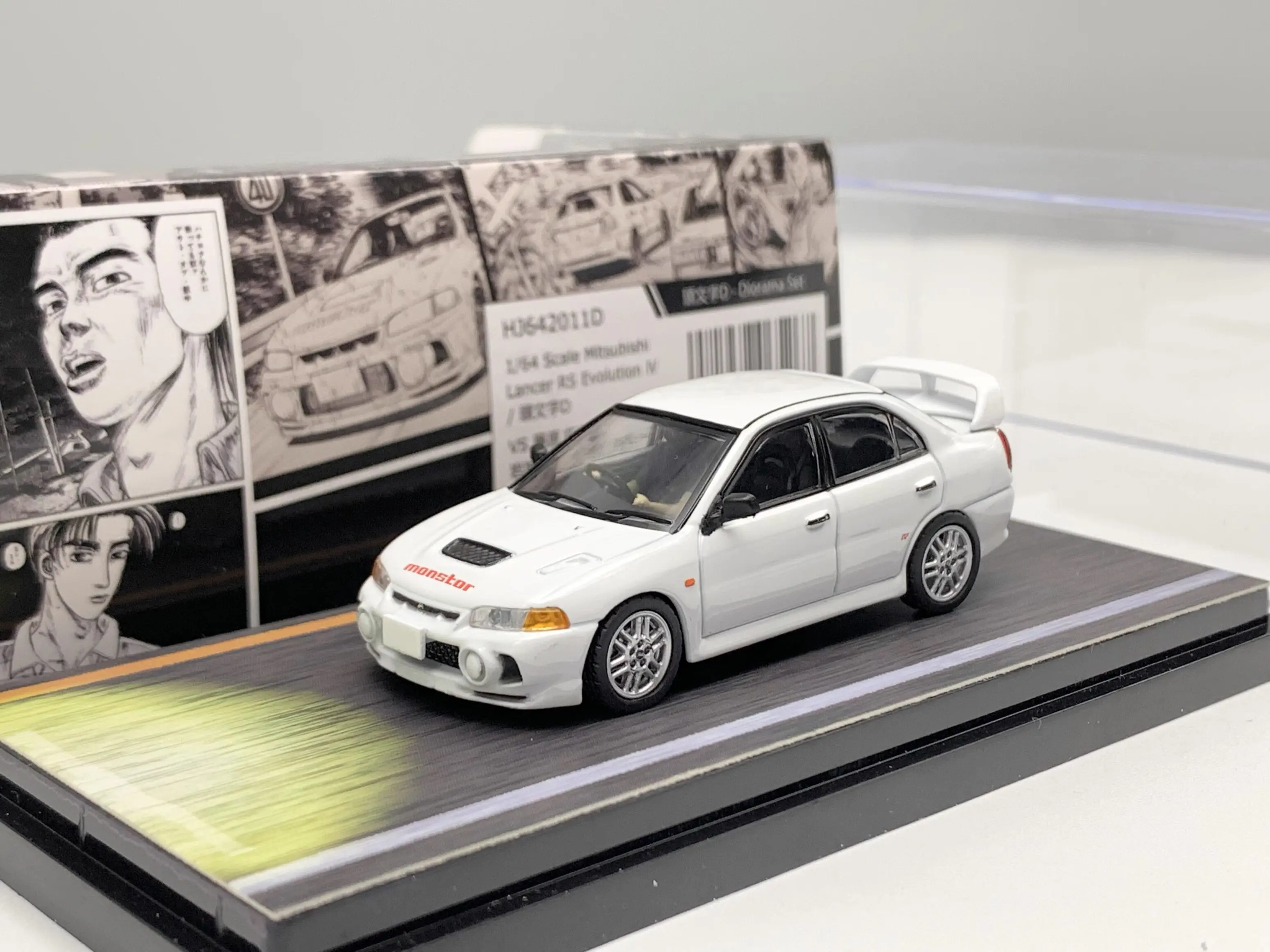 Modèle de voiture en alliage blanc Mitsubishi EVO 4 à l'échelle 1:64 de Diecast Hobby Japan