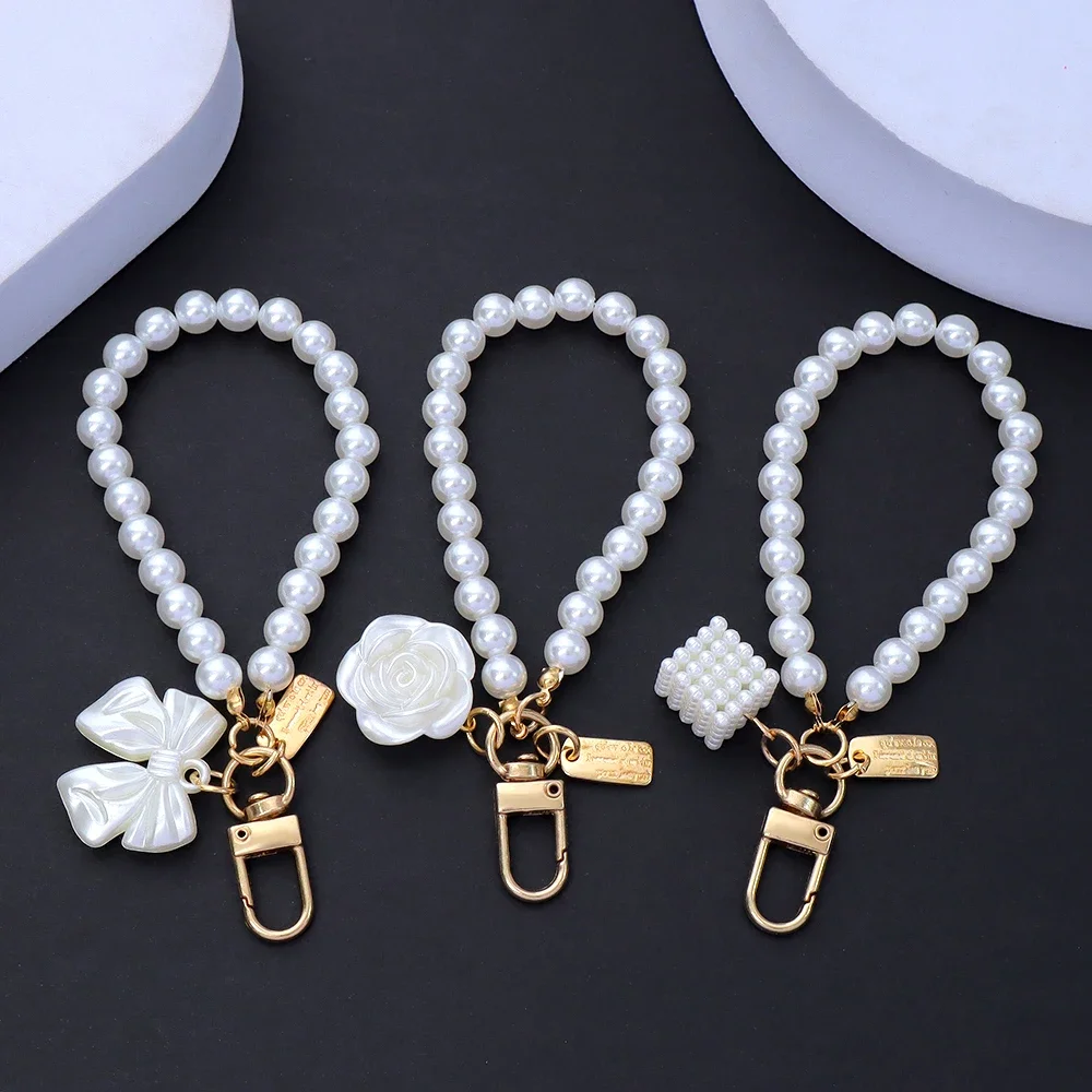 Fashion Rose Flower Bow Pendant Key Ring Anti-Loss Pearl Chain Wristband Keychain For Women Phone Handbag Ornament Party Gifts