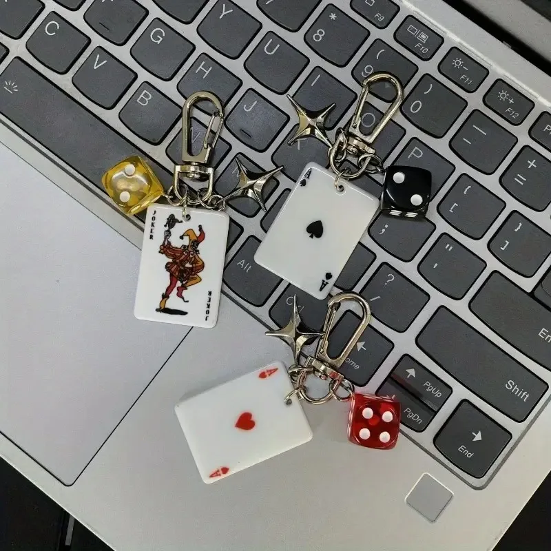 The keychain comes with a joker or clown charm, dice, and stars ,the perfect bag accessory for all types of bags, measuring