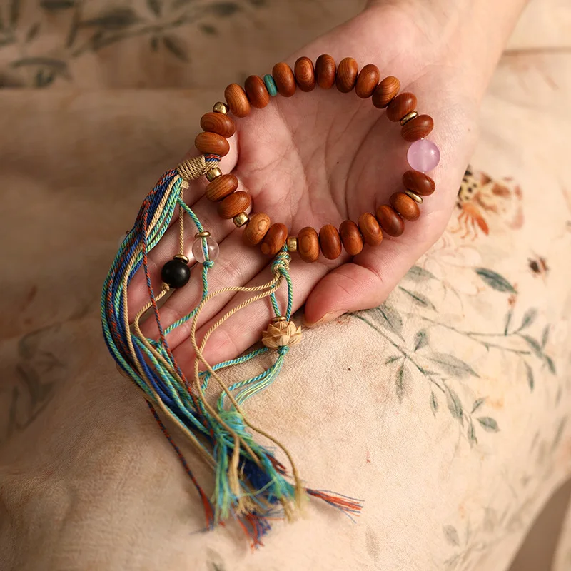 

Natural Wood Grain Lotus Sandalwood Bead Bracelet, Handcrafted Colored Ribbon Beads, Retro Colored Tassels, Cotton Rope Bracelet