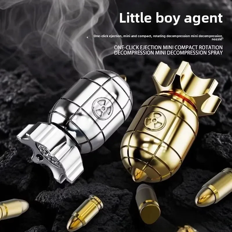 New creative agents small nuclear bomb can rotate decompression toy gun can eject backpack keychain pendant small gift.