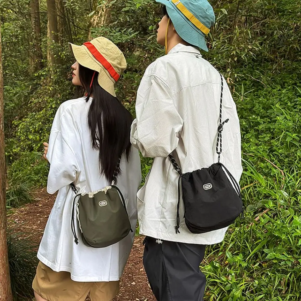 

Sports Nylon Shoulder Bag Solid Color Casual Drawstring Crossbody Bag Coin Pouch Korean Style Mobile Phone Pack Outdoor