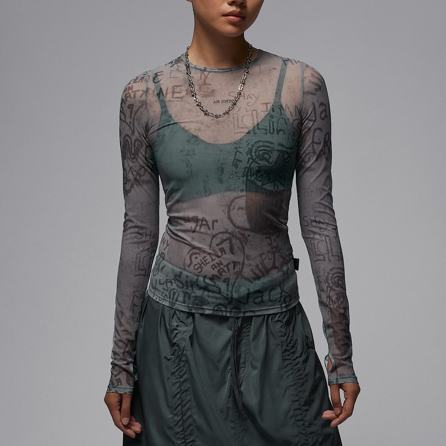 

Оригинальные женские футболки Nike JORDAN с полной цветной печатью, легкие, дышащие, облегающего кроя, с длинными рукавами, модель HQ9175-070.