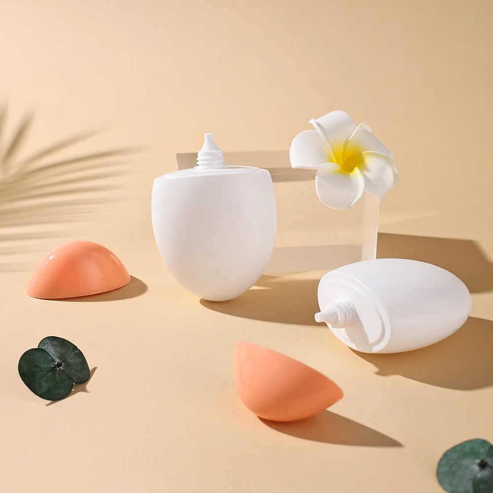 2 個 50 ミリリットルホワイト & オレンジキャップ卵型 PE 空のローションプラスチックボトルセット詰め替え旅行容器日焼け止め化粧品用