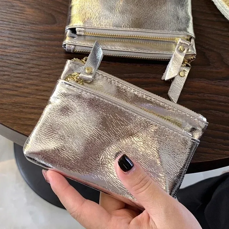 Mini Cartera de cuero genuino de plata, bolso de mano multifuncional con cremallera, monedero portátil, tarjetero