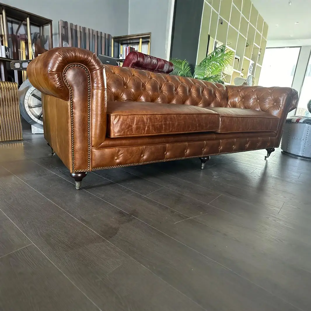 

American retro industrial style living room leather buckle hotel reception medieval wax leather three-person straight row sofa