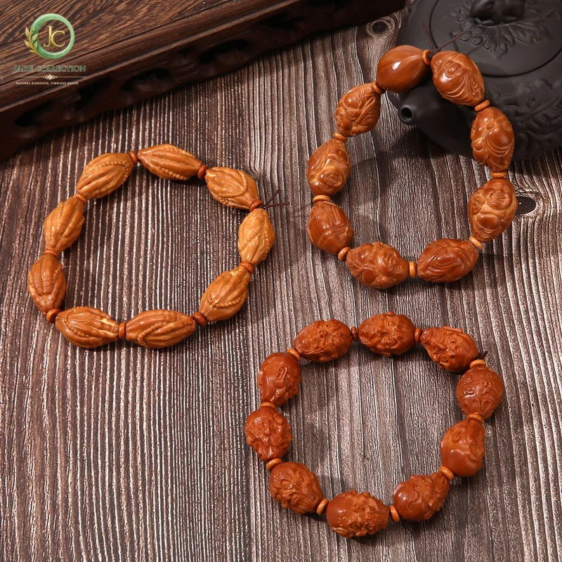 Hand-carved olive pit bracelet featuring the Eighteen Arhats and the God of Wealth, a handcrafted art piece for men and women to