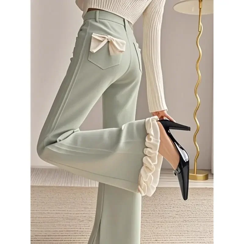 Primavera 2025 traje verde suelto de estilo francés con pantalones de pierna ancha de retales con volantes pantalones largos de mujer elegantes y a la moda