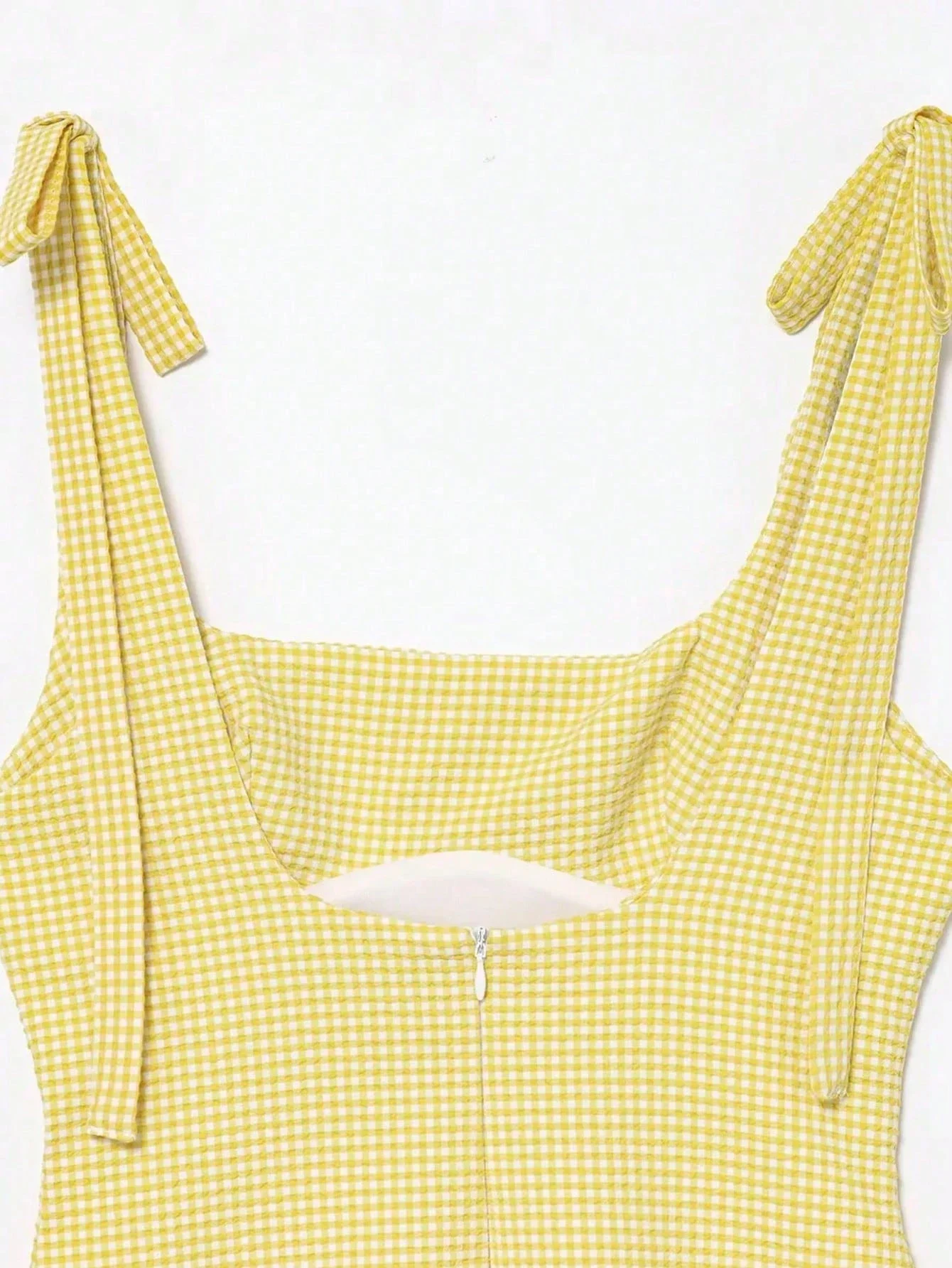 

Желтое мини-платье в клетку с завязками на бретелях и квадратным вырезом