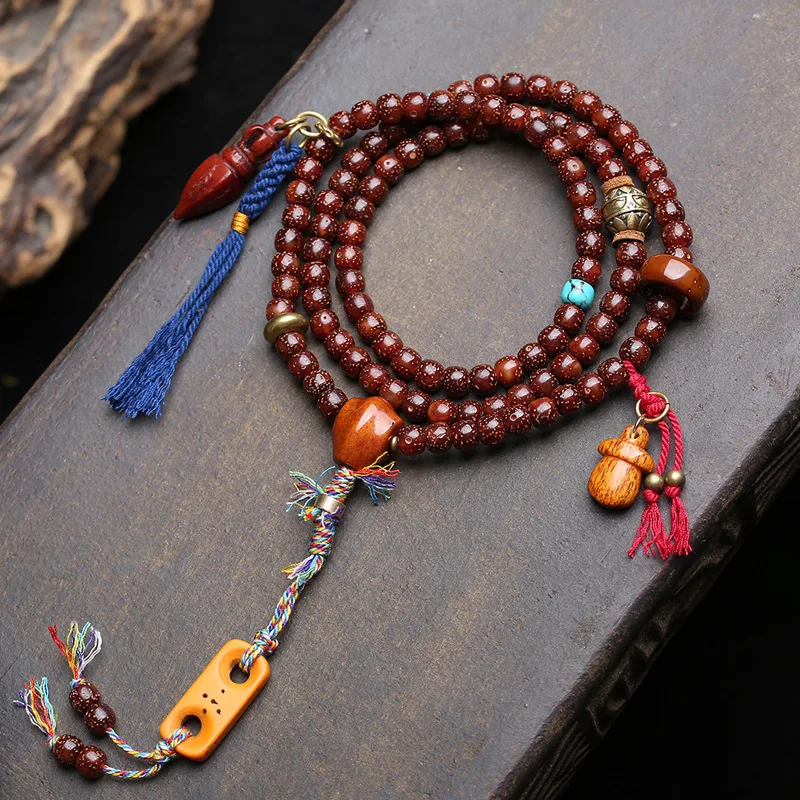 Natural reddish-brown old-seed star-moon bodhi seed prayer beads with purple-gold rat-running-circle and backflow patterns