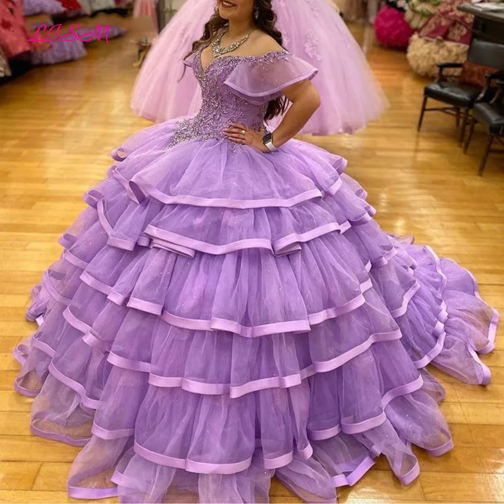 

Lilac Ball Gown Quinceanera Dresses Off Shoulder Lace up Closure Sweep Train Tiered Appliques Beads Sweet 15 Dress robe de bal