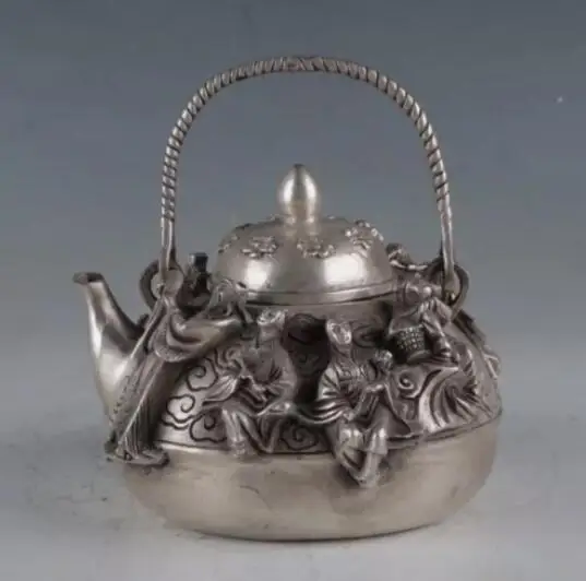 

Chinese Tibetan silver hand carved Eight Immortals Teapot w Daming Xuande Marks