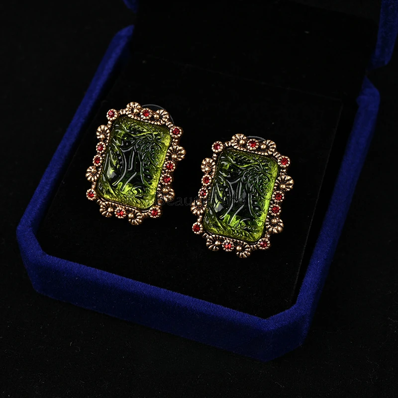 

Medieval light luxury jewelry emerald glazed stud earrings niche earrings