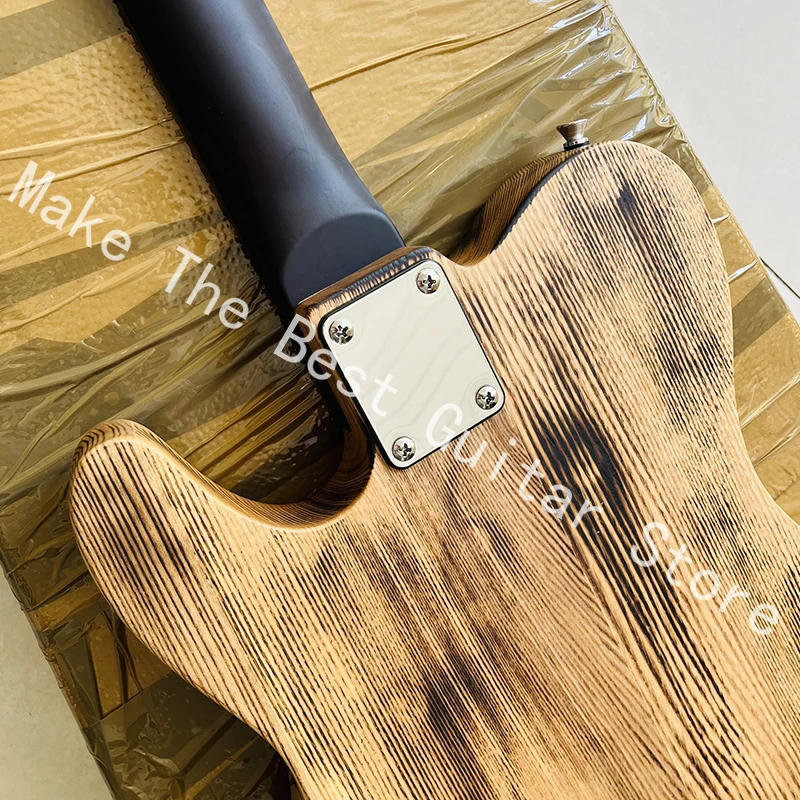 Carving old electric guitars in classic natural wood color, professional quality assurance, and fast delivery.