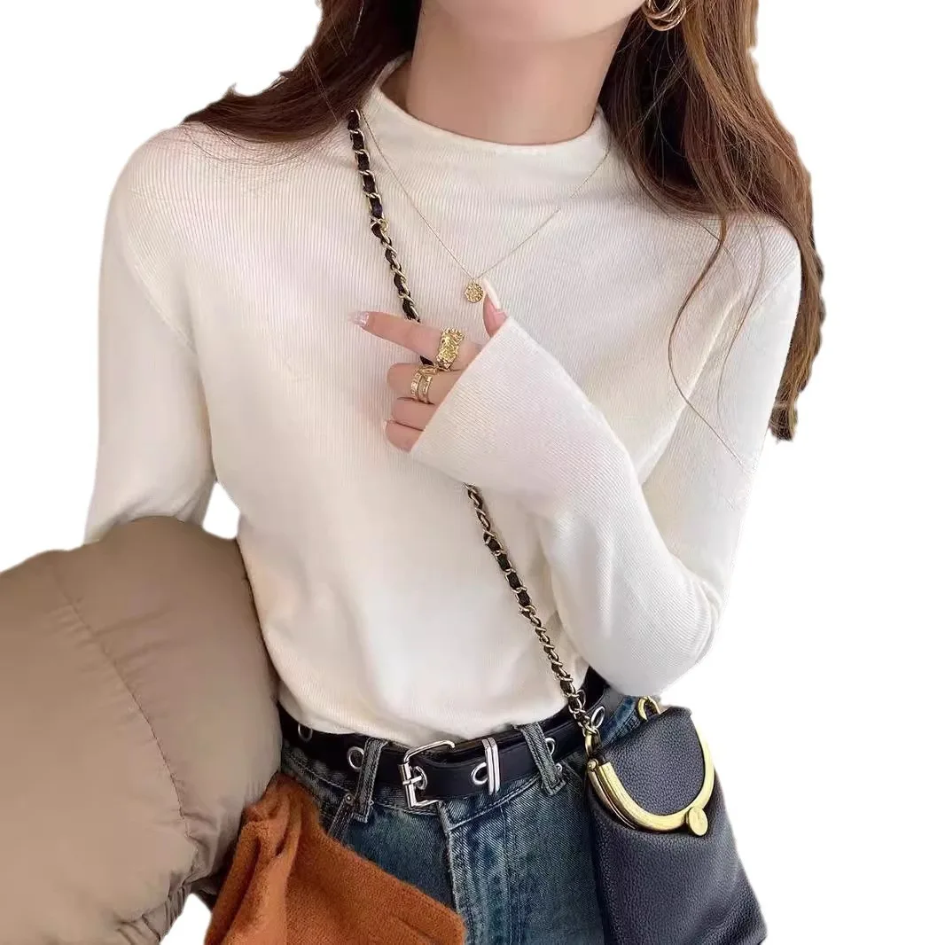 Nueva moda mujer Color sólido Simple básico suelto Casual moda medio cuello alto manga larga suéteres de punto camiseta interior femenina