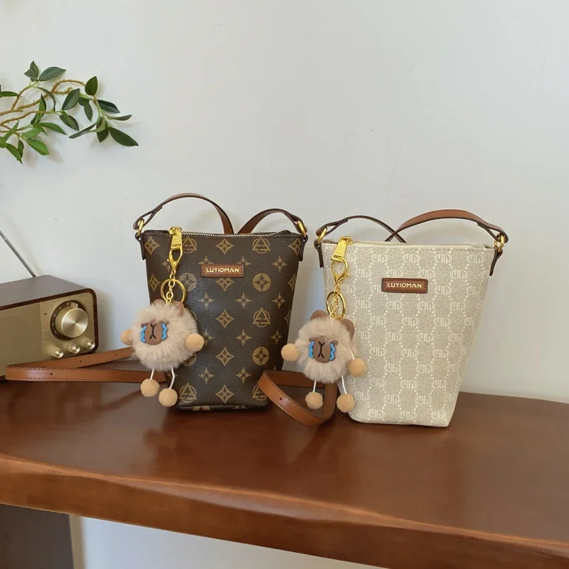 

2025 Premium Luxury Bucket Bag for Women Detachable Chain Unique Textured Leather Crossbody Tote for Work Commute