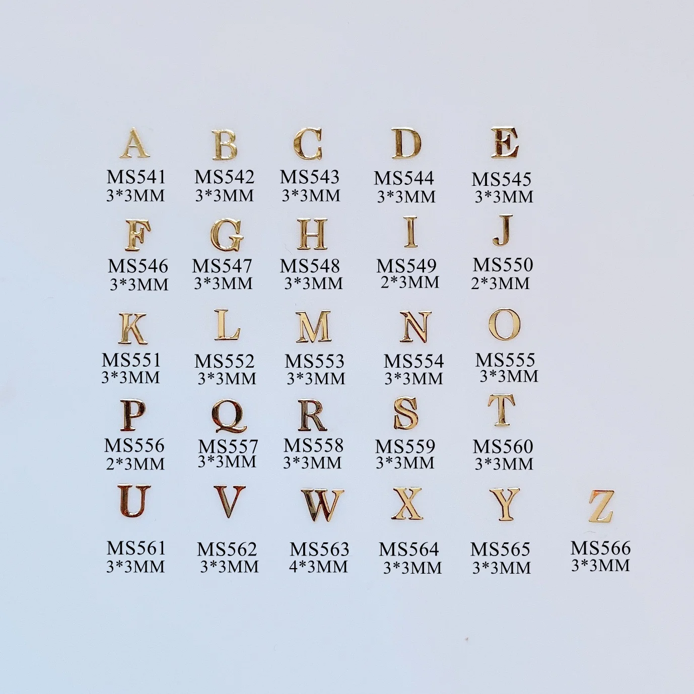 

Approx. 100pcs/bag Gold Metal Alphabet Letters Design non-adhesive Soft Metal Slices Nail Art Decoration M-40