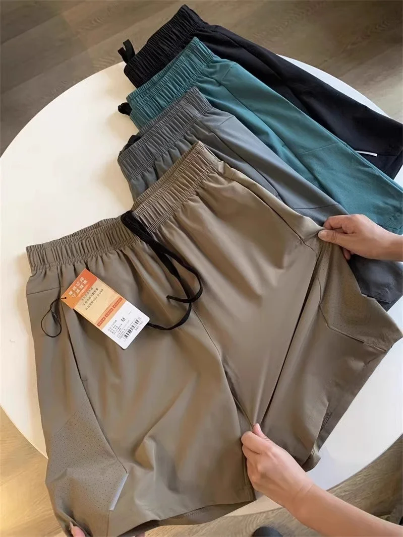 

Легкие дышащие спортивные штаны Qui Dry для мужчин и женщин для бега, повседневные брюки Moisture ng Five-Quarter L...