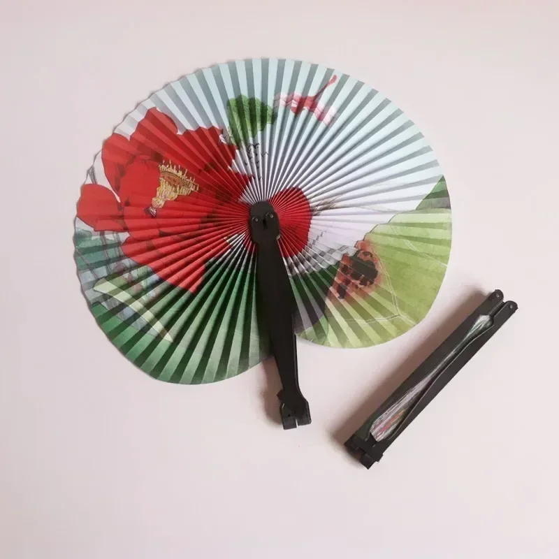 Abanico de papel plegable de estilo chino aleatorio, molino de viento Retro, papel redondo pequeño, decoración de Color, abanicos de papel, regalo de mano impreso para fiesta, 1 ud.