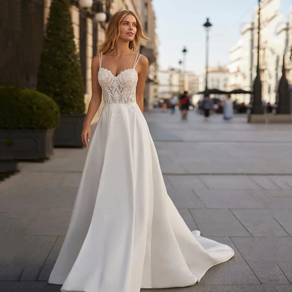

2026 Custom Elegant Wedding Dress, Spaghetti Strap Lace Sleeveless V-Neck A-Line Train Bridal Gown, Button Wedding Dress.