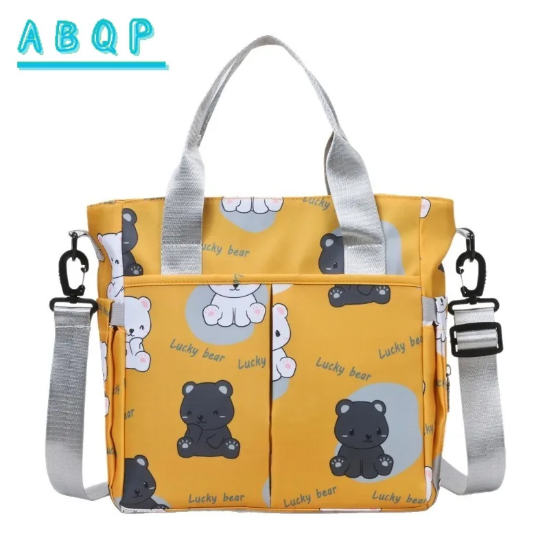 abqp-new-diaper-bag-handbag-luxury-brand-cartoon-baby-diaper-shoulder-bag-large-capacity-fashionable-baby-products-storage-bag