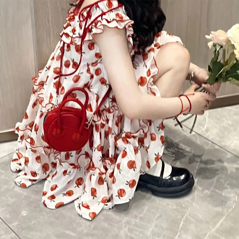 Stylish Folds Slash Neck Dresses Bow Sweet Printed Female Clothing Sleeveless 2024 Summer Loose A-Line Casual Spliced Midi Dress