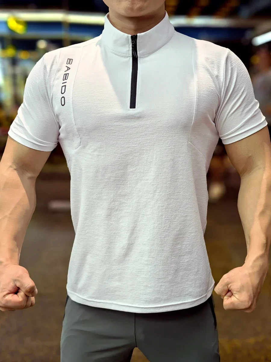 Mężczyźni Fitness Odzież sportowa Kulturystyka Trening Koszulka Siłownia Bieganie Koszulka z krótkim rękawem Tshirty Muscle Fit Top Szybkoschnący