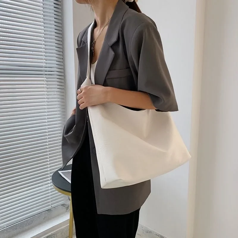 Contemporary Tote Bag Premium Leather Spacious Design Modern Minimalist Aesthetic Secure Storage Versatile Styling