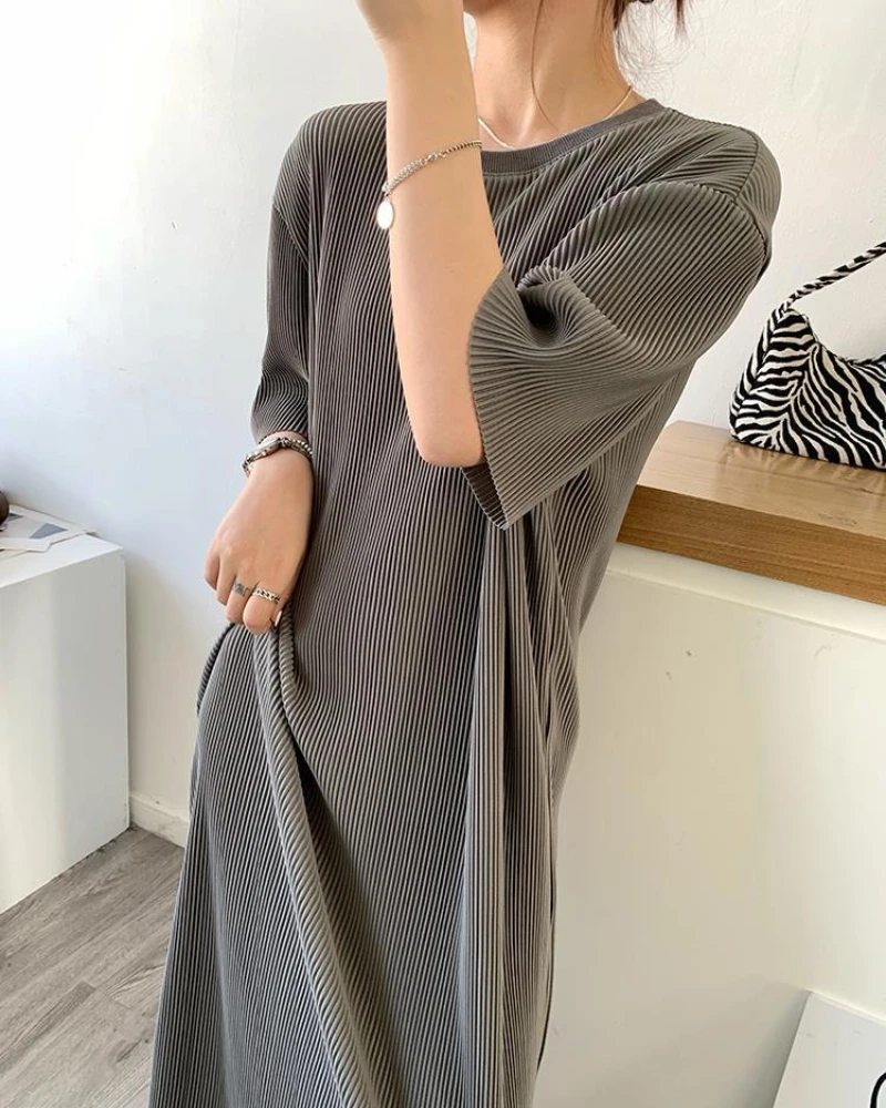 Loose solid color round neck dress female 2023 Korean version mid-length bottoming skirt lazy T-shirt long skirt tongqin