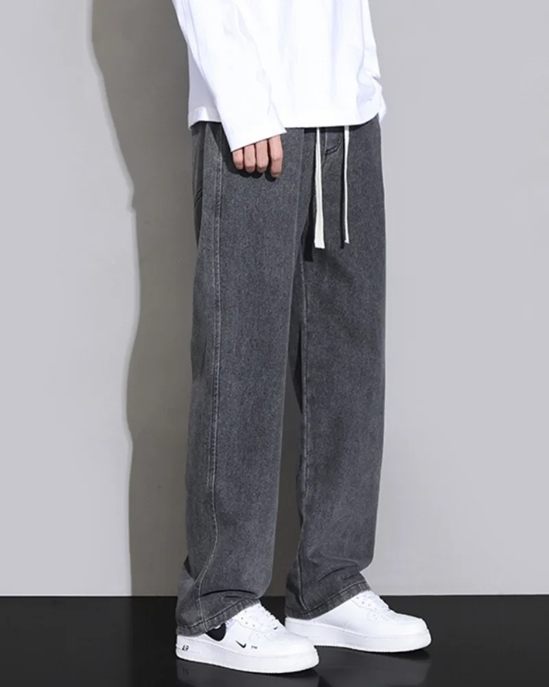 Outono e inverno novos jeans americanos de rua alta para homens, design solto e reto com cordão, calças juvenis