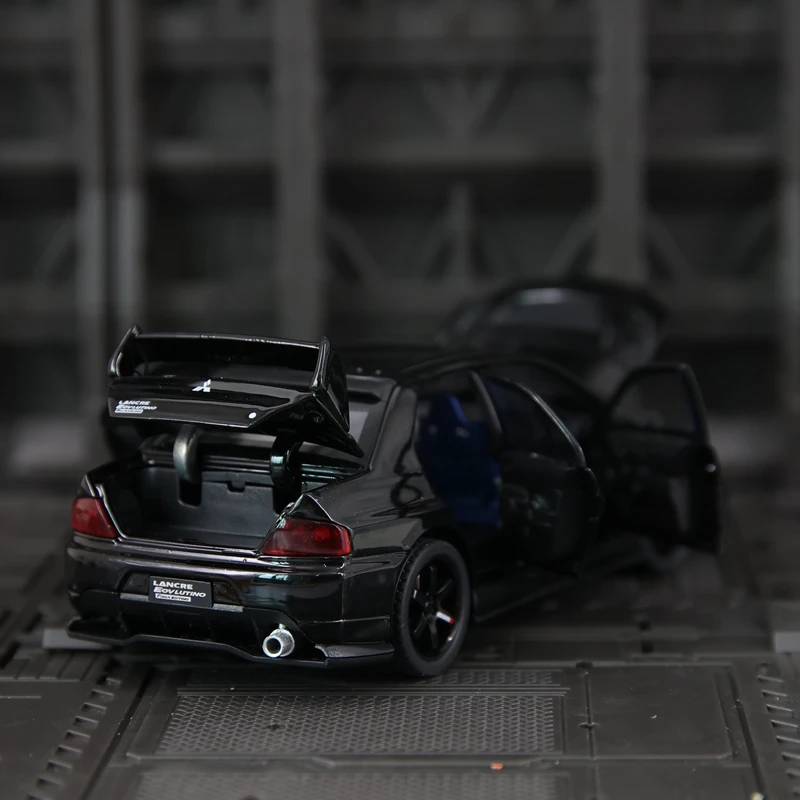 1:32 Mitsubishi EVO 9. a generación, modelo de coche de rally de aleación, colección de adornos, puertas y capó del motor, el maletero se puede abrir