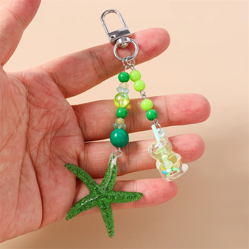 Niedliche handgefertigte Perlen-Schlüsselanhänger, Sommer-Strand-Sternfisch-Muschel-Anhänger, Schlüsselringe für Damen und Herren, Autoschlüssel, Handtaschen-Schlüsselanhänger, DIY-Geschenke – Detail 32