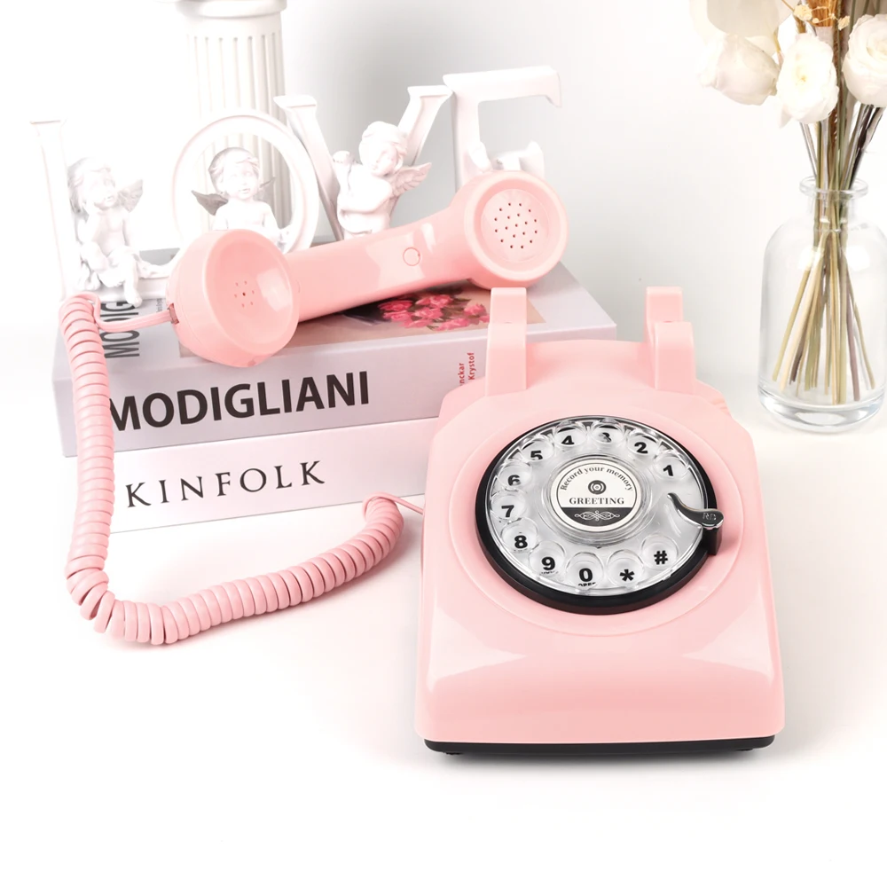 Retro corded telephone, landline telephone, office/home decorative item, classic black rotary dial audio.