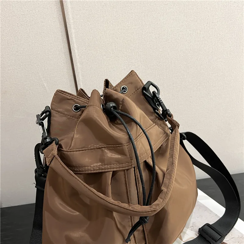 Korean Fashion Nylon Fabric Drawstring Bucket Bag Personalized Versatile Handheld One Shoulder Crossbody Bag for Daily Leisure