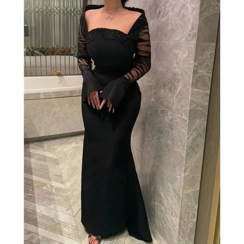 Vestidos de fiesta de satén de sirena negros modernos Vestidos de fiesta de lentejuelas con cuentas brillantes plisados sin tirantes sexy Mangas largas 2025 Personalizado