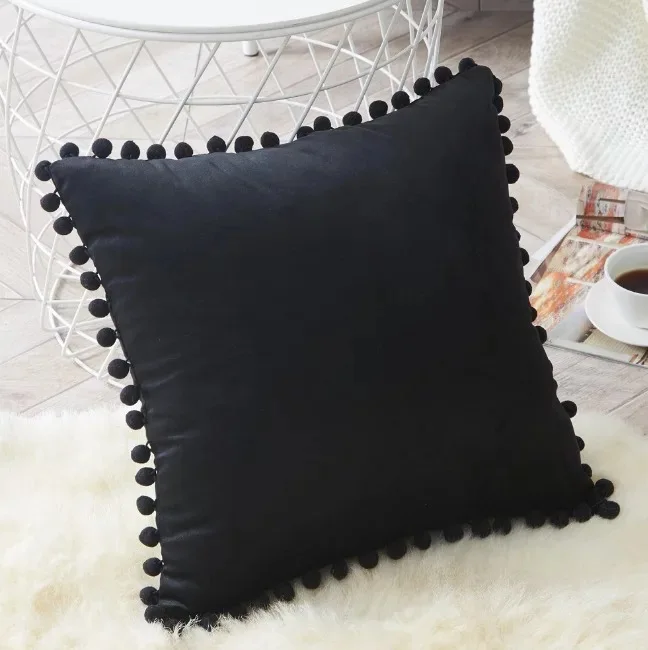 Black pom-pom pillow cover styling view