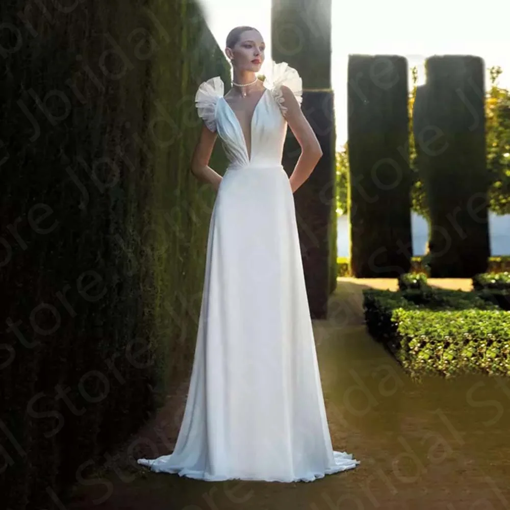 

Charming Boho White Wedding Dresses Puff Short Sleeves Bridal Gowns V Neckline Bride Chiffon Back Out Court Train