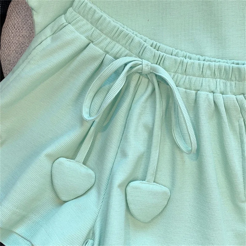 2025 الصيف الفتيات الملابس مجموعات الأطفال قصيرة الأكمام دعوى الاطفال خطابات تي شيرت السراويل 2 قطعة الزي الرياضي الموضة لطيف الملابس