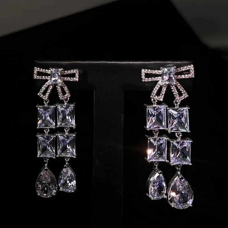 المبيعات الساخنة، الفاخرة الخفيفة، مزاج الحلو، الأقراط المرصعة، الأزياء والتنوع، التصميم المتخصص، الأقواس، قطرات الماء، الزر #1