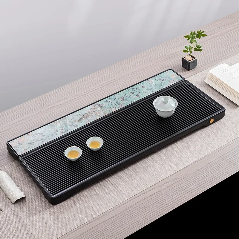 High-end modern light luxury simple household bakelite tea tray imported electric bakelite tea sea luxury stone kung fu tea set