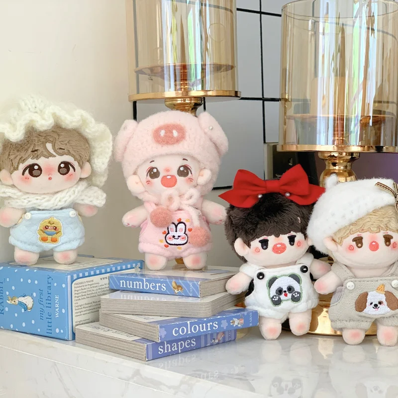 10 سنتيمتر دمية القطن ملابس الطفل لطيف الحمالات المرنة سلسلة لا سمة العالمي دمية خلع الملابس لبدلة Kawaii باليد